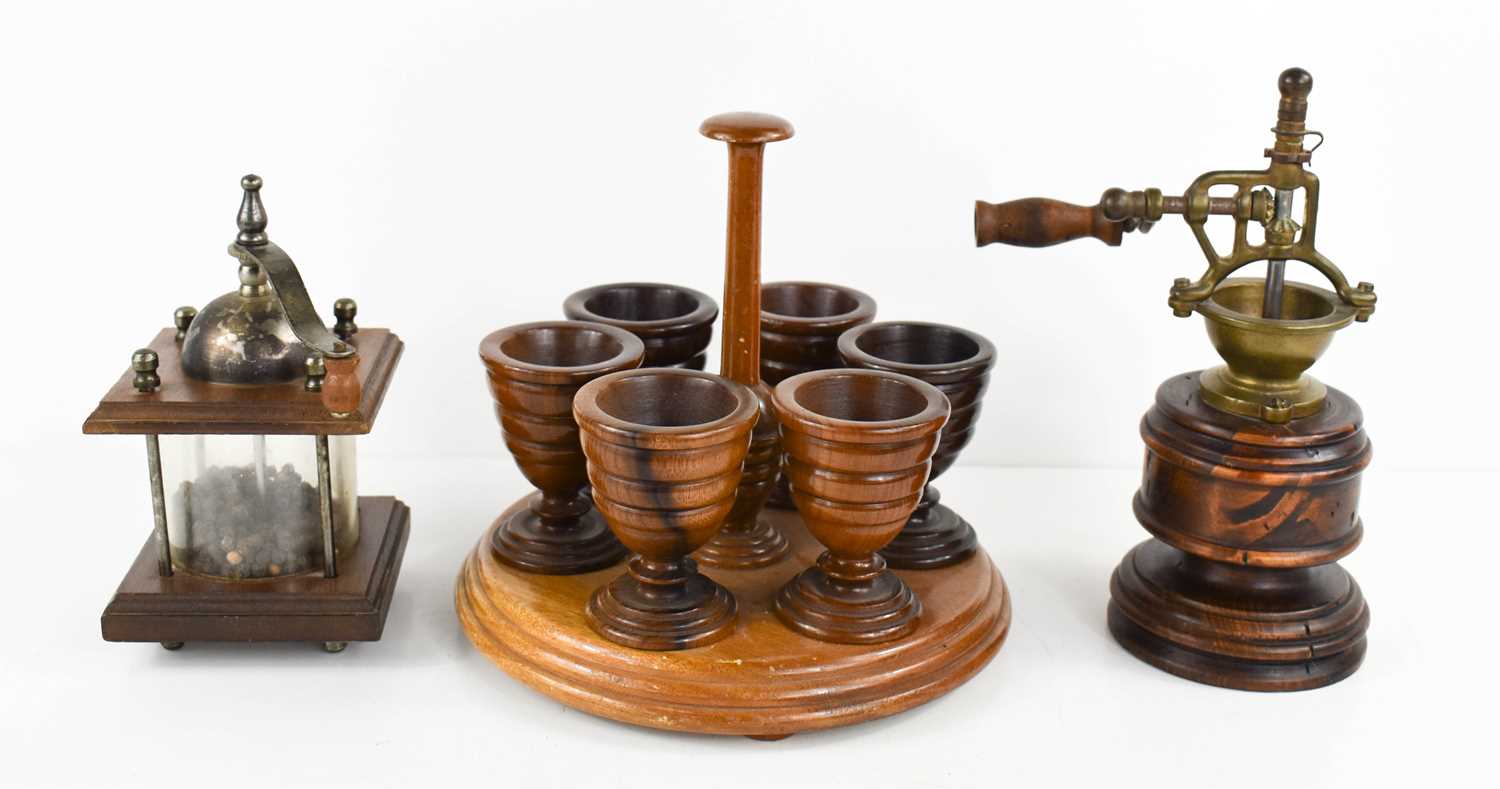 Lot 40 - A 19th century treen eggcup stand, with six...