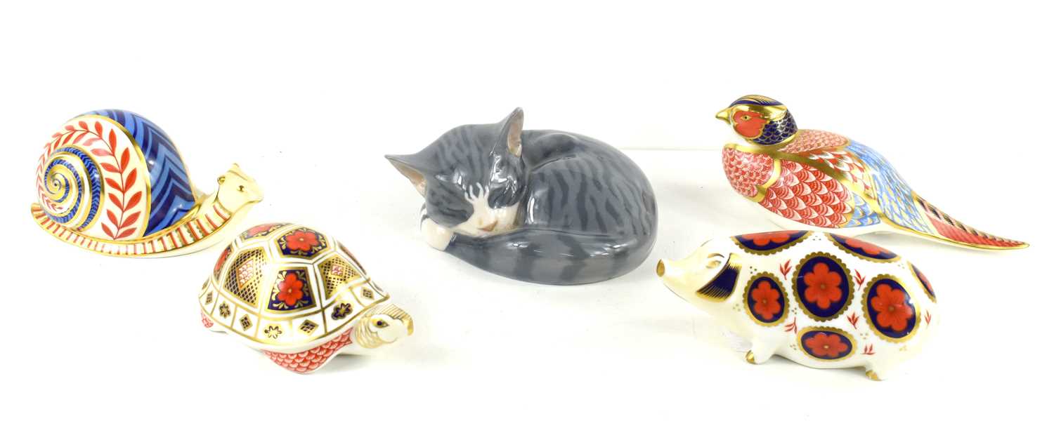 Lot 165 - Four Royal Crown Derby Imari paperweights...