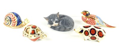 Lot 165 - Four Royal Crown Derby Imari paperweights...