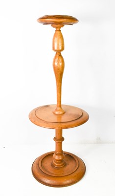 Lot 50 - A 19th century satinwood ashtray on stand, the...