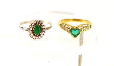 Lot 118 - An 18ct gold, emerald and diamond ring, the...