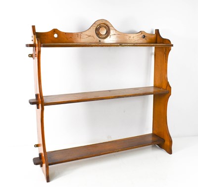 Lot 73 - A 19th century fruitwood wall shelf, composed...