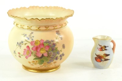 Lot 137 - A Royal Worcester blush ivory vase decorated...