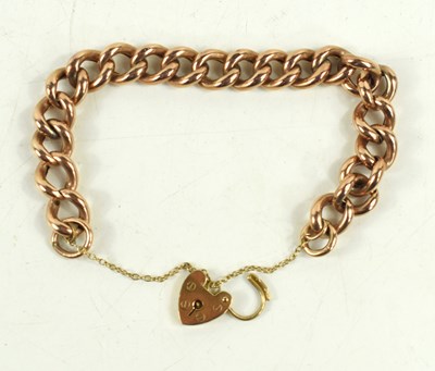 Lot 136 - A 9ct gold curb link charm bracelet, with...