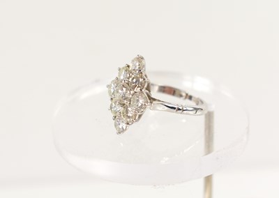 Lot 12 - A diamond dress ring, set with nine brilliant...