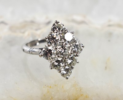 Lot 12 - A diamond dress ring, set with nine brilliant...