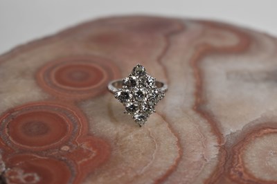 Lot 12 - A diamond dress ring, set with nine brilliant...