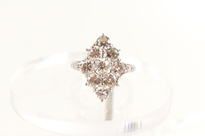 Lot 12 - A diamond dress ring, set with nine brilliant...