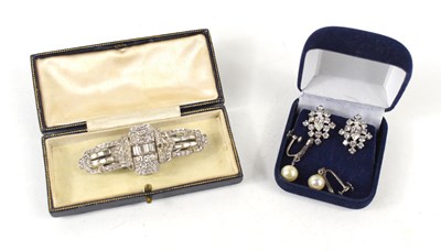 Lot 217 - An Art Deco metamorphic dress brooch, inbuilt...