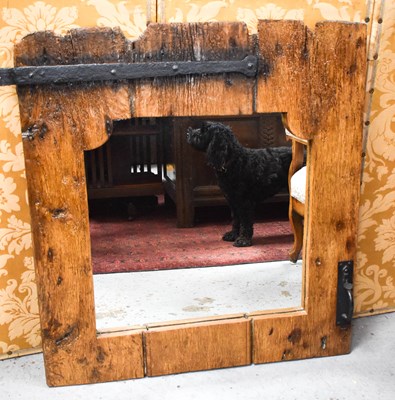 Lot 106 - A large pine mirror, made from a stable door,...