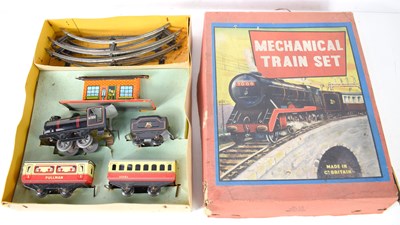 Lot 341 - A vintage mechanical tin plate train set,...