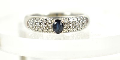 Lot 120 - An 18ct white gold, sapphire and diamond ring,...