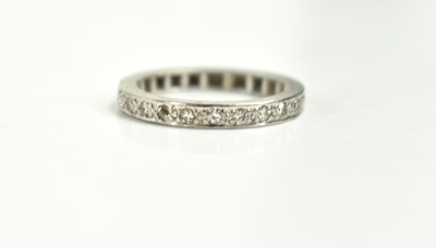 Lot 119 - A diamond eternity ring, size J, unmarked...