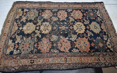 Lot 246 - A 19th century Persian rug with blue ground...