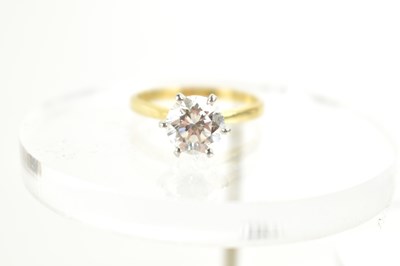 Lot 222 - An 18ct gold, platinum and diamond solitaire...