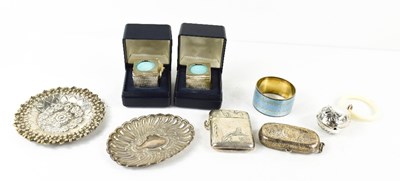 Lot 273 - A group of silver to include two embossed...