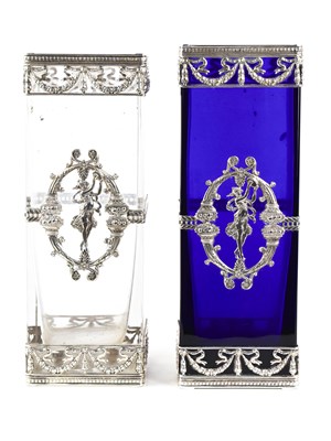 Lot 409 - Two 19th century white metal and glass vases...