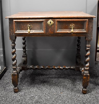 Lot 297 - A 17th century oak side table with single...