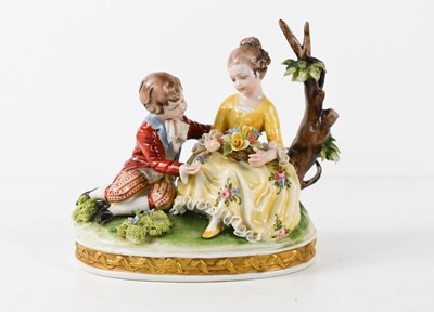 Lot 142 - A 20th century Capodimonte figure group of two...