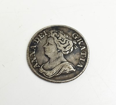 Lot 296 - A Queen Anne silver milled shilling dated 1711.