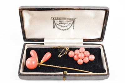 Lot 204 - A 9ct gold and coral set stick pin, 6.44g...