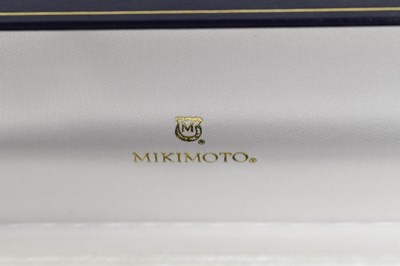 Lot 5 - A Mikimoto pearl necklace, with a 9ct gold,...
