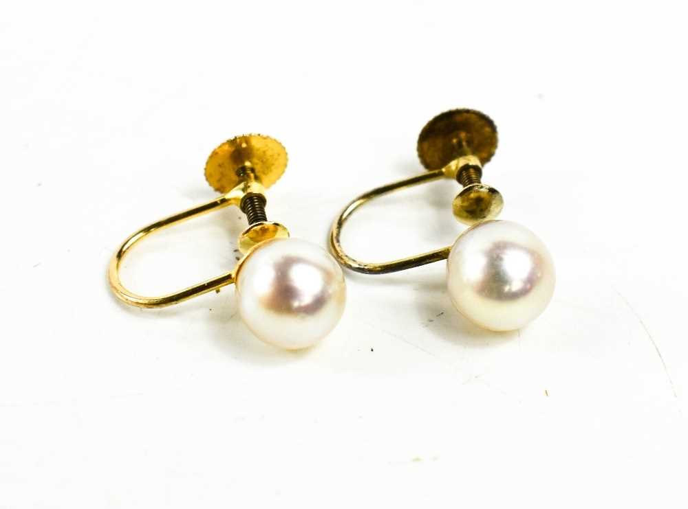 Lot 20 - A pair of 9ct gold and pearl earrings, the...