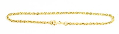 Lot 22 - A 9ct gold ropetwist bracelet, with circular...