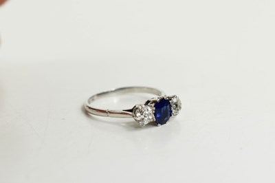 Lot 15 - An 18ct white gold, diamond and sapphire ring,...