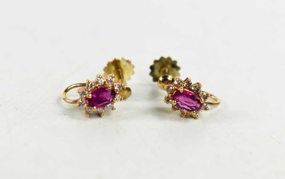 Lot 21 - A pair of 9ct gold, pink sapphire and diamond...