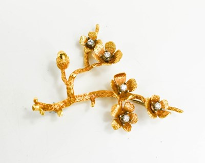 Lot 2 - An 18ct gold and diamond set branch & blossom...