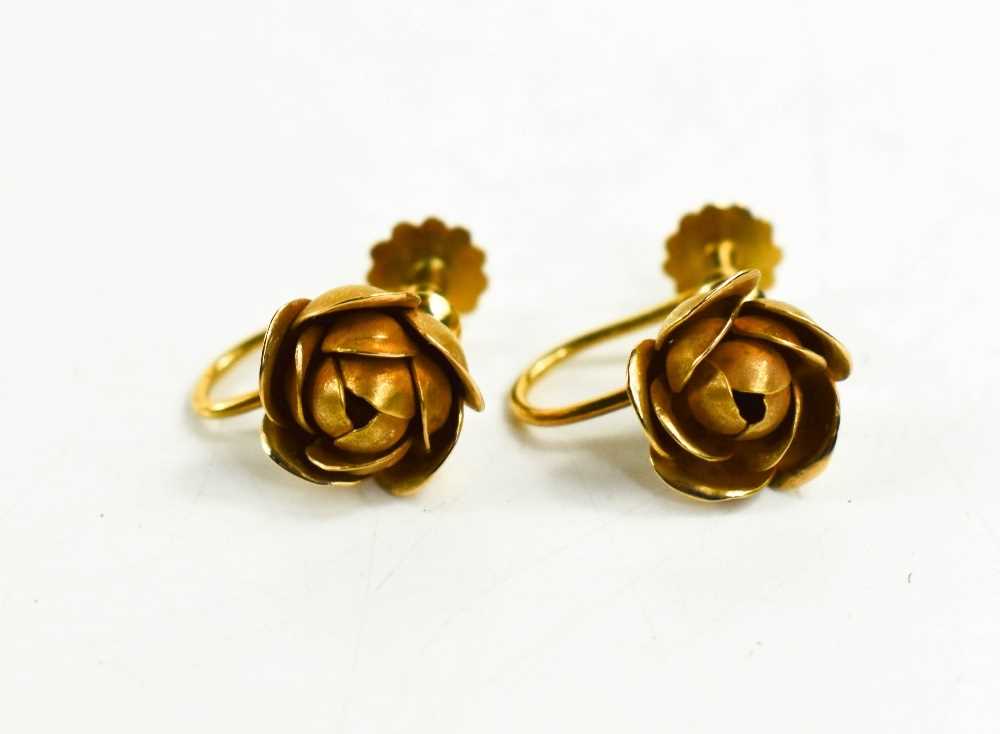 Lot 31 - A pair of 9ct gold flower head form earrings,...
