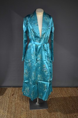 Lot 64 - A Chinese silk turquoise blue coat, decorated...