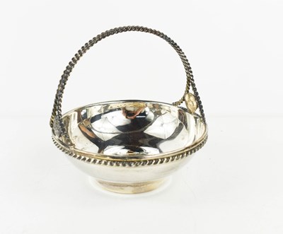 Lot 379 - A silver basket form bon bon dish, with a...