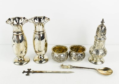 Lot 394 - A group of silver to include a pair of silver...