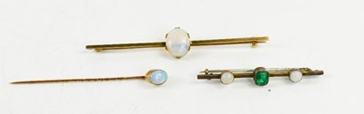 Lot 255 - A 9ct gold and opal set bar brooch 7½cm long,...