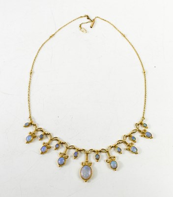 Lot 160 - A gold and opal necklace, set with graduated...