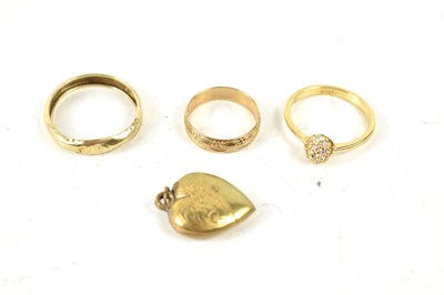 Lot 211 - Three 9ct gold rings, one set with white...