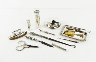 Lot 230 - A group of silver grooming accessories...