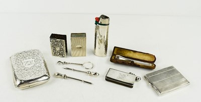 Lot 375 - A group of silver smokers accessories...