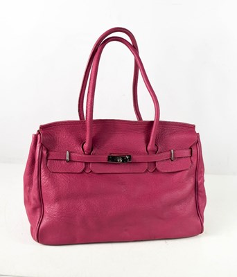 Lot 274 - A Weekender bag in soft pink leather by Memo's...