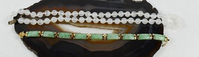 Lot 238 - A white jade bead necklace, 50cm long, 37.8g,...