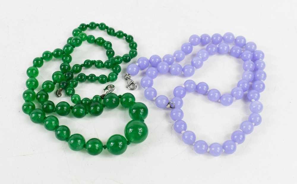 Lot 40 - A string of lavender amethyst beads, 45cm long,...