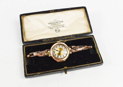 Lot 334 - A vintage lady's gold cased wrist watch, the...