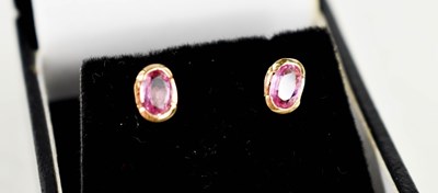 Lot 132 - A pair of 18ct gold and pink sapphire earrings,...