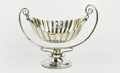 Lot 403 - A silver scalloped bowl on stand with twin...