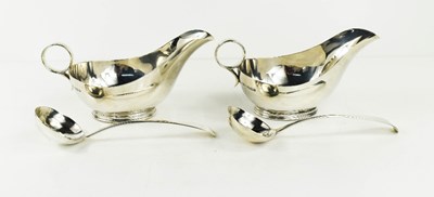 Lot 408 - A pair of Georgian silver sauce boats and...