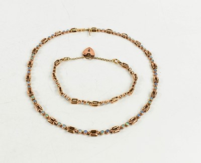 Lot 163 - A 9ct gold and opal set necklace and bracelet...