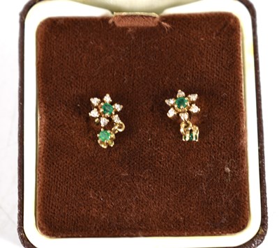 Lot 78 - A pair of 9ct gold, diamond and emerald...