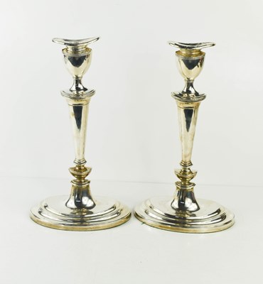 Lot 401 - A pair of elegant silver candlesticks,...